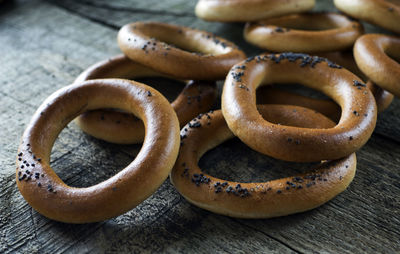 Close-up of bagels on wooden table