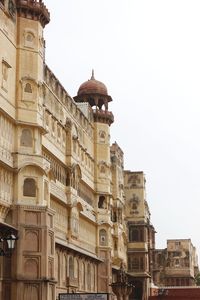 Low angle view of buildings against sky