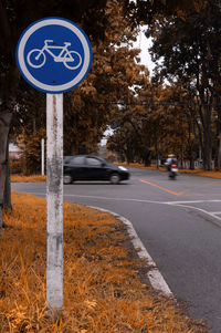 Road sign on street in city