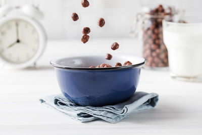 Close-up of coffee cup on table