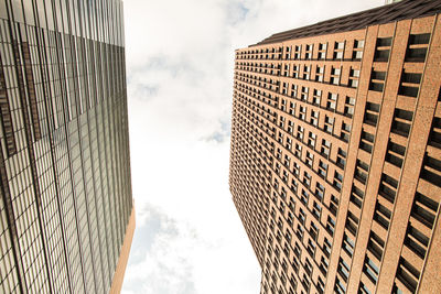 Low angle view of skyscraper against sky