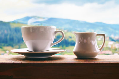 Close-up of coffee cup on table