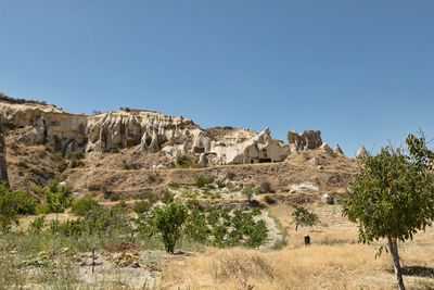 Rocky landscape against clear blue sky