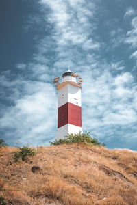 Low angle view of lighthouse against sky