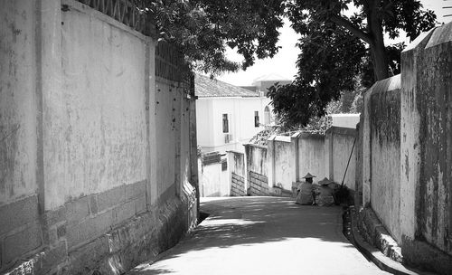 Narrow alley along buildings