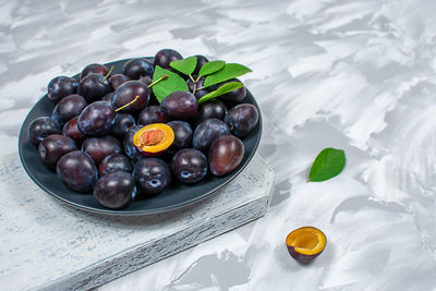 Close-up of grapes on table