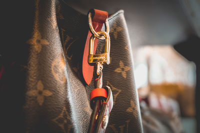 Close-up of chain hanging on rope