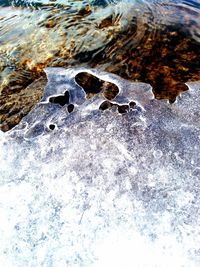 Close-up of water on beach