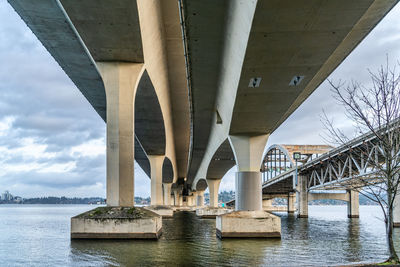 A view from beneath bridges that span lake washington in seatttle.