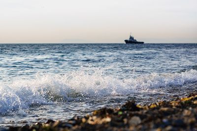 Scenic view of sea against clear sky