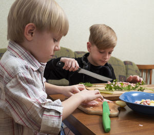 High angle view of friends on table