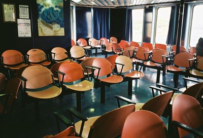 Empty chairs and table in cafe