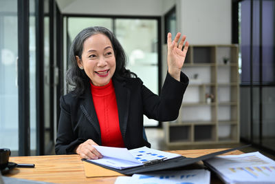 Portrait of businesswoman working at office