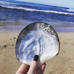 Carved tahitian shell at the beach