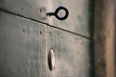 Close-up of door handle on wall