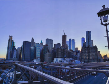 Skyscrapers in city against clear sky