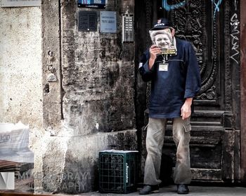 Full length of man photographing