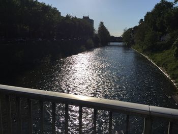 River amidst trees against sky