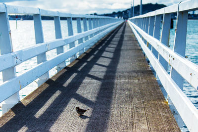 Footbridge against sky