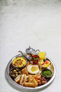 High angle view of meal served on floor