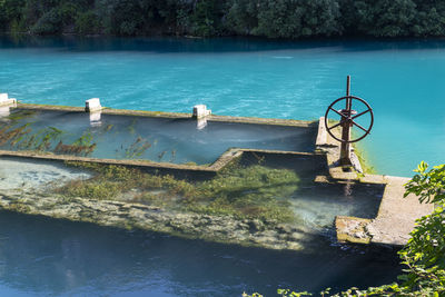 High angle view of lake against trees