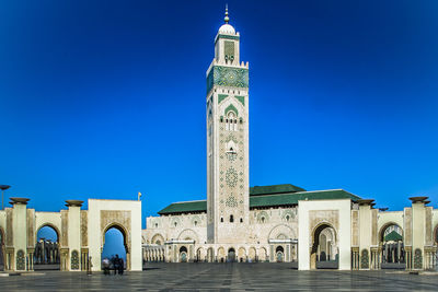 View of mosque against clear blue sky, casablanca morocco 
