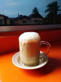 Close-up of coffee served on table