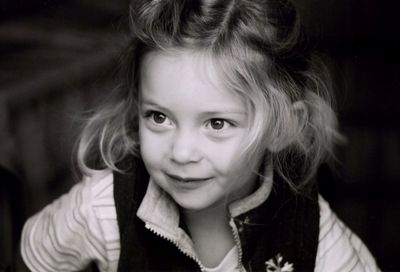 Close-up portrait of smiling girl