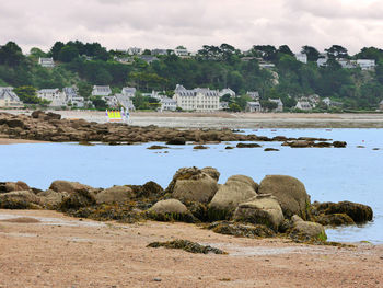 Scenic view of beach against sky