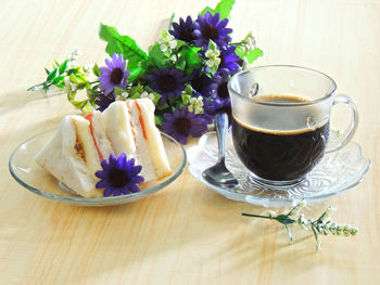 Close-up of coffee served on table