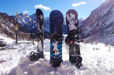 Panoramic view of people on snow covered mountain