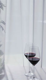 Close-up of wineglass on table