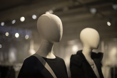 Rear view of woman with arms raised