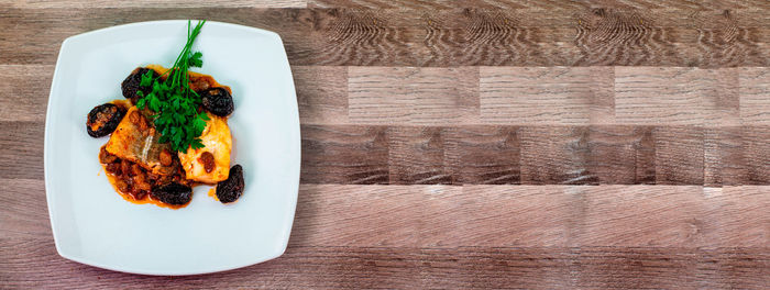 Directly above shot of food in plate on table