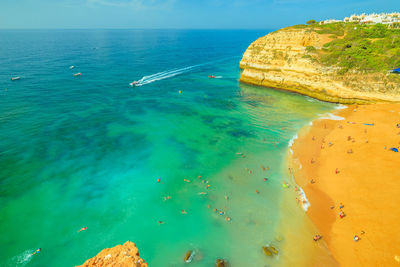 High angle view of sea shore against sky