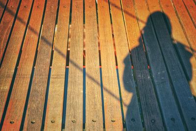 High angle view of two people on hardwood floor