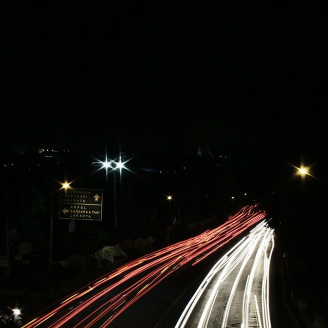 illuminated, night, long exposure, light trail, transportation, speed, motion, blurred motion, road, traffic, city, the way forward, on the move, lighting equipment, highway, street, street light, city life, red, tail light