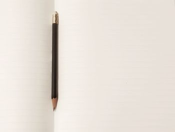 Close-up of book against white background