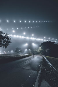 View of illuminated street at night