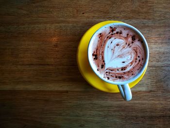 Directly above shot of cappuccino on table