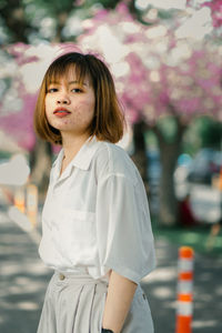 Portrait of girl standing outdoors