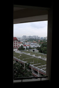 Cityscape seen through window