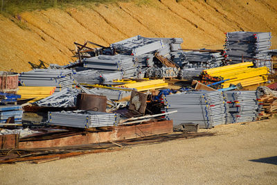 High angle view of damaged chairs on field