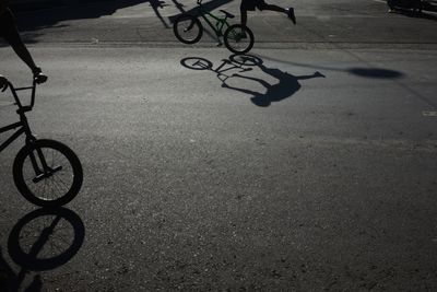 Low section of person riding bicycle