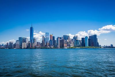 New york cityscape against blue sky
