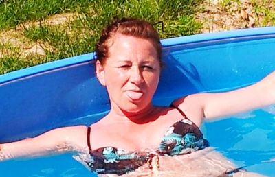 Thoughtful young man in swimming pool