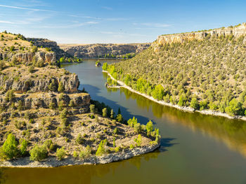 Scenic view of river against sky