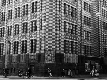 People walking on modern office building