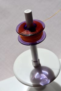 High angle view of multi colored candles on table