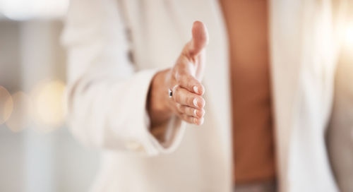 Midsection of woman with hands